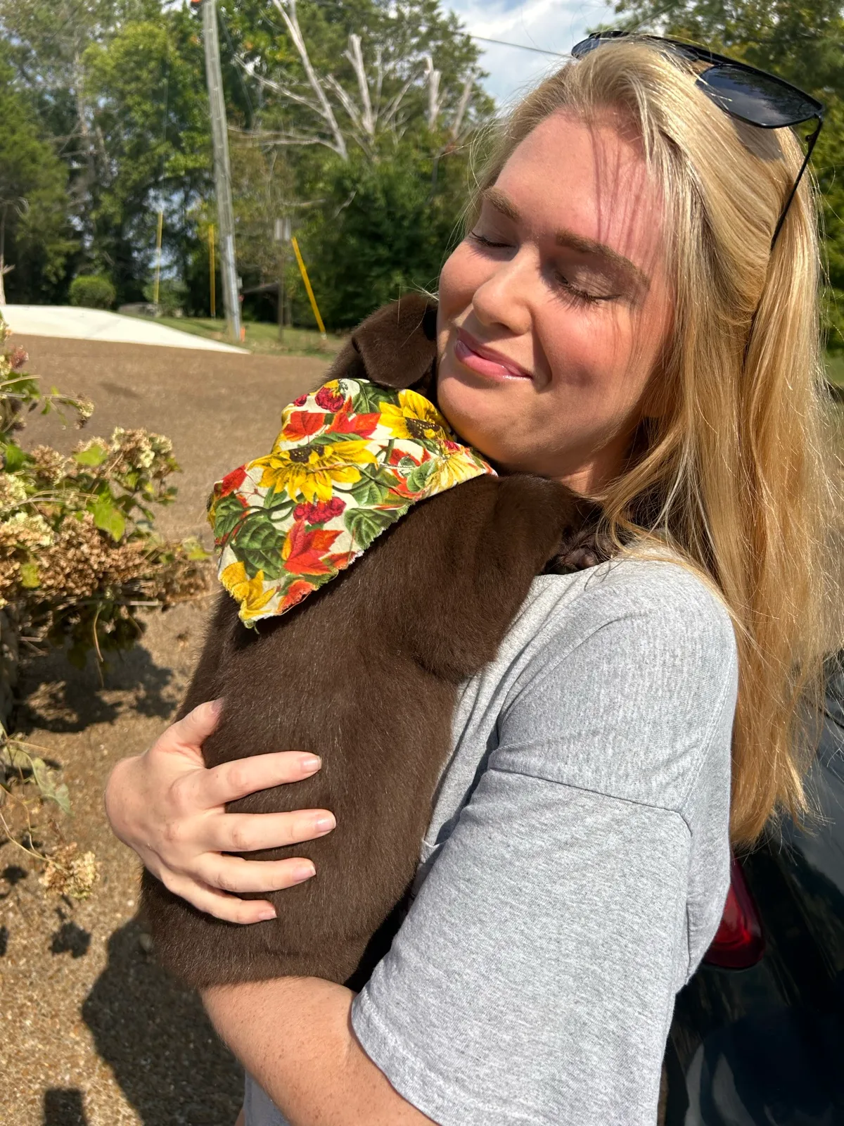 A family meeting their new Happiest Labrador puppy on gotcha day