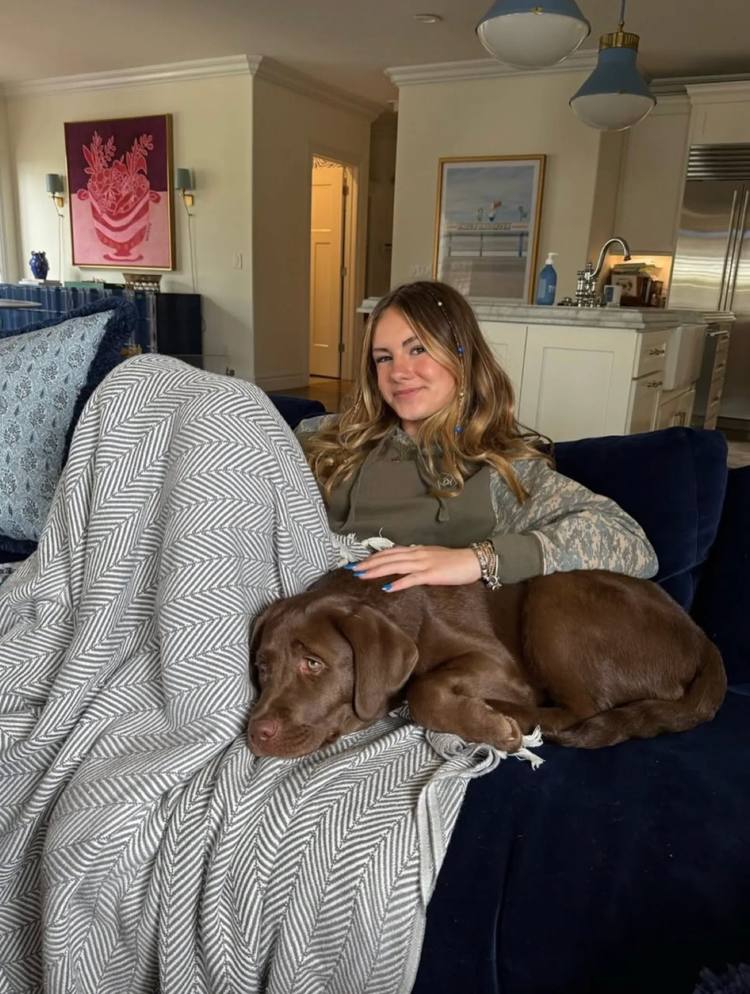 A previous Happiest Labrador puppy at home with their family
